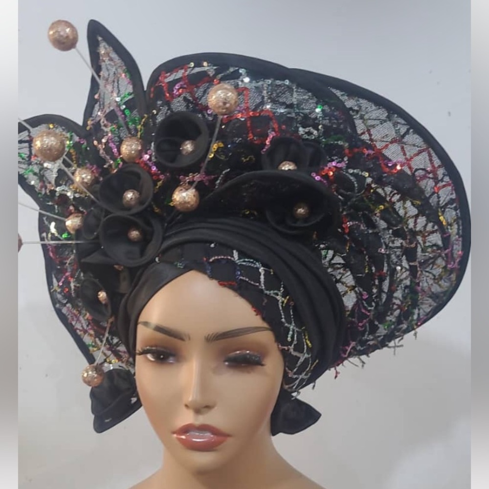 Embellished Black Fascinator Headwrap with Multicolor Netting

GEL6 0326